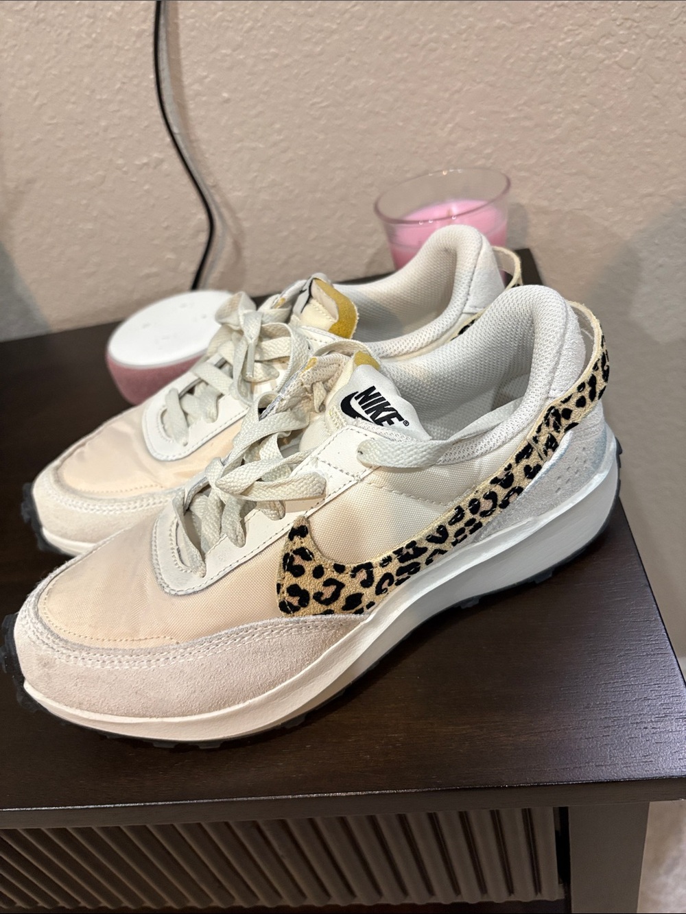 Nike Women's Cream Sneakers with Leopard Swoosh Accent